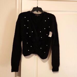 Beautiful, super soft, black "Almost Famous" sweater with pearls on it.